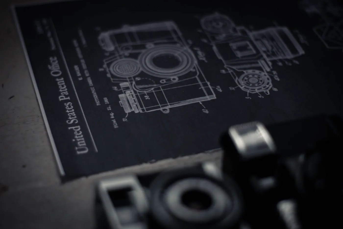 A United States Patent Office drawing of a camera beside the camera itself
